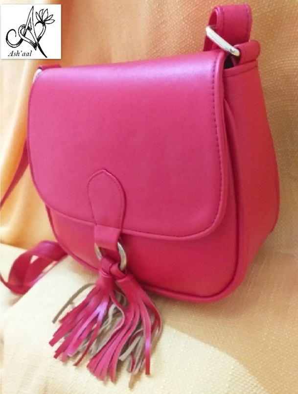 Red bag with tussles