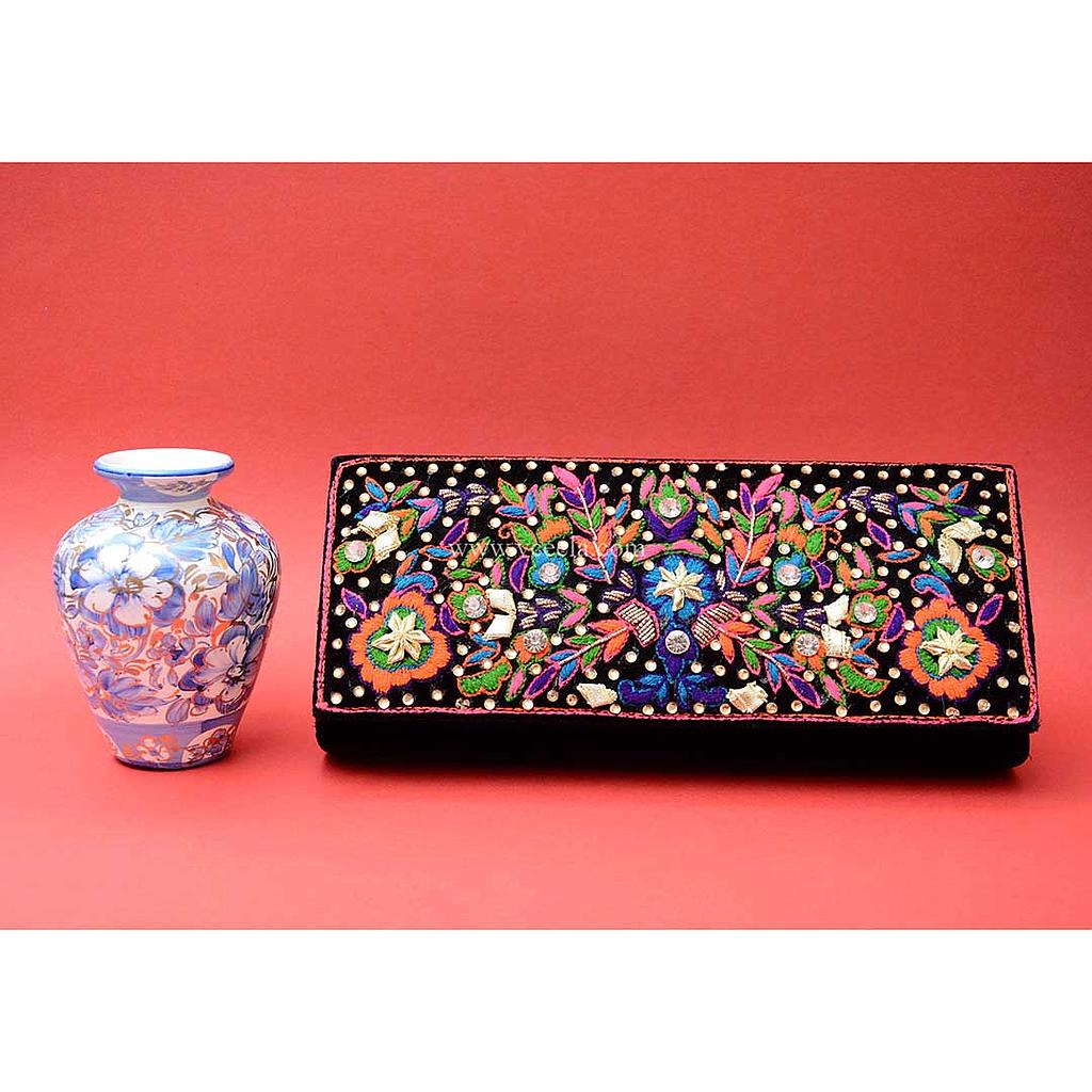 Hand embroidered clutch