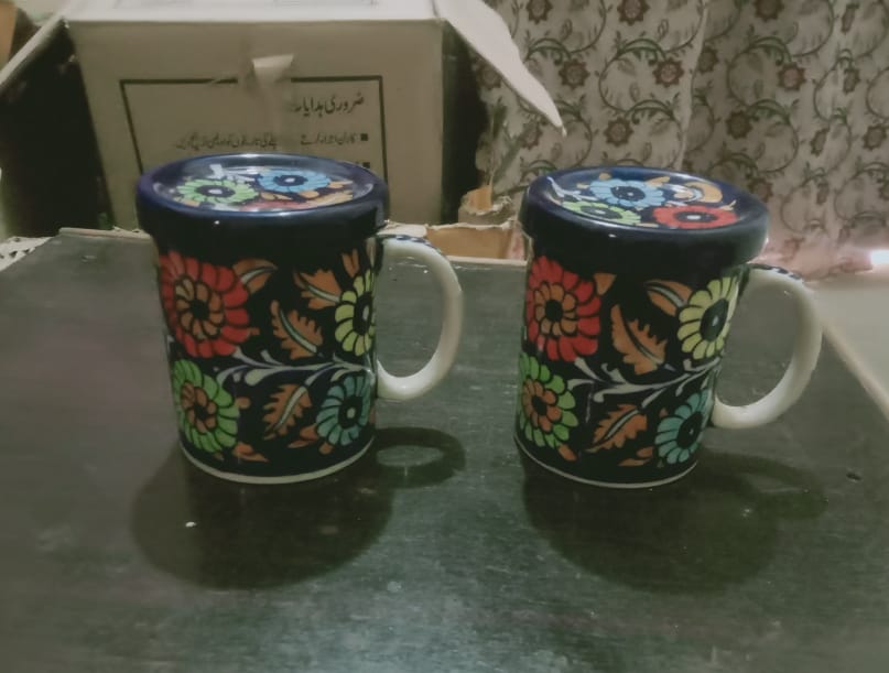 Blue pottery mugs